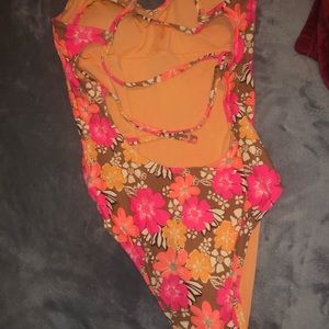 Flower one piece cut out in back